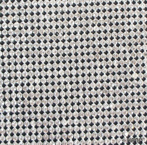 Close-up of Crystal Clear 3mm diamante gems on sheet