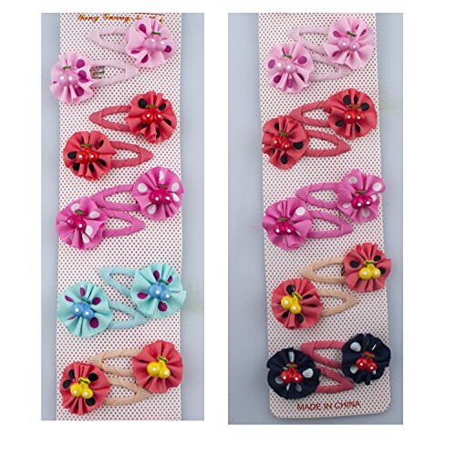 Close-up of a rosette hair clip barrette in pink.