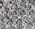 Close-up of the silver flowers trim showcasing intricate details.