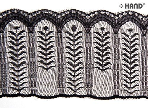 10 metres of black lace trim displayed on a flat surface