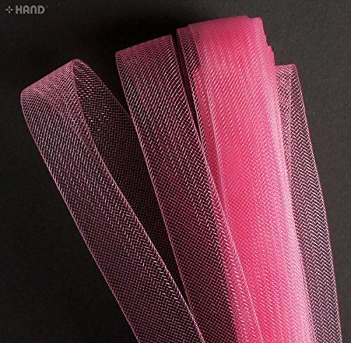 Close-up of 20 mm wide nylon crin trim in salmon pink