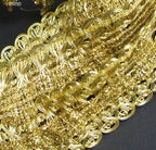 Close-up of the 40 mm wide gold metallic trim showing its texture.