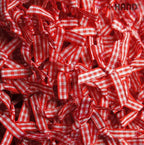 Close-up of chequered red and white bow trim detail