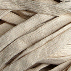Flat cream cotton rope cord trim displayed on a white background.