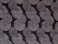 Close-up of printed blue cloth with circle pattern