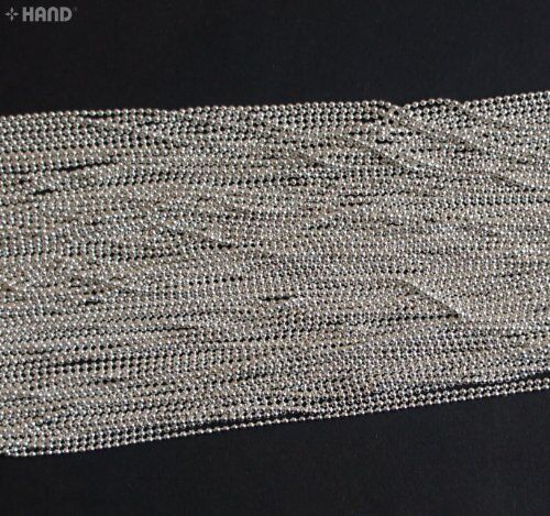 Detailed shot of dark copper beads in the chain