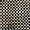 Close-up of decorative black and clear diamante gems on hot-fix sheet.