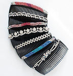 Close-up of crystal rhinestones on a large hair slide comb.