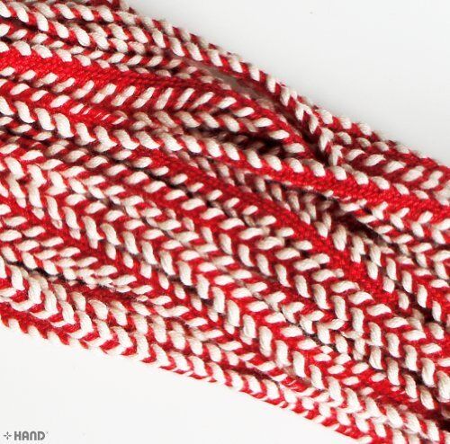 BRT10 Red with White Edges Cord Rope Trim rolled up for easy storage.