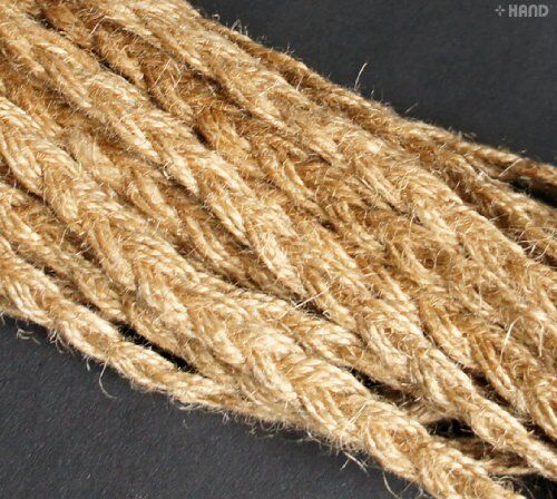 BRT31 Rough Flax Brown Braid Rope Cord Trim displayed on a table