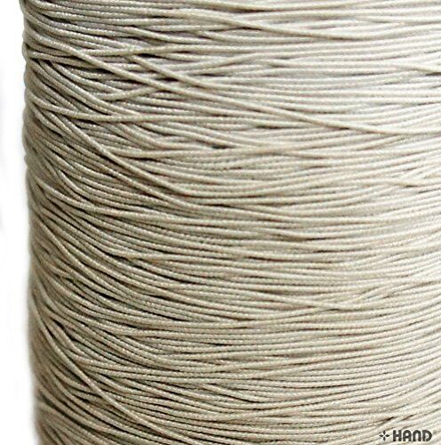 Measuring off white shirring elastic for crafting projects