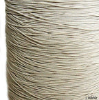 Measuring off white shirring elastic for crafting projects