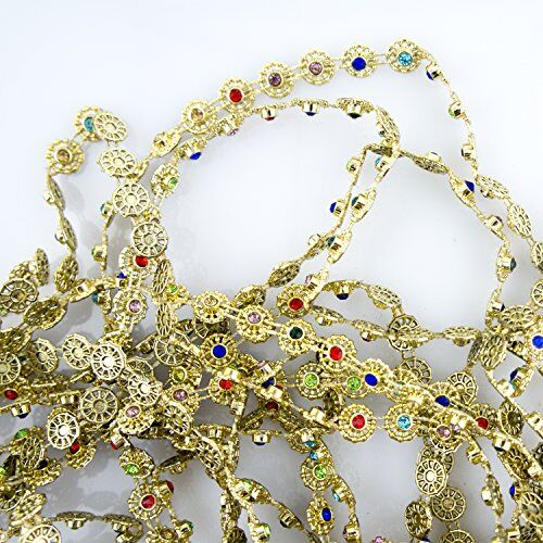 Gold tone trim with colourful crystals, 9mm wide.