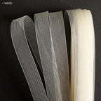 Cream nylon crin trim displayed on a white background.
