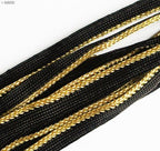 Black with gold edge sew in pipe trim on a white background