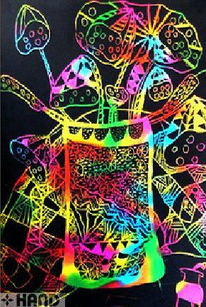Close-up of scratch art paper showing vibrant colours