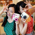 Close-up of Fujifilm Instax Mini Film showcasing glossy finish.