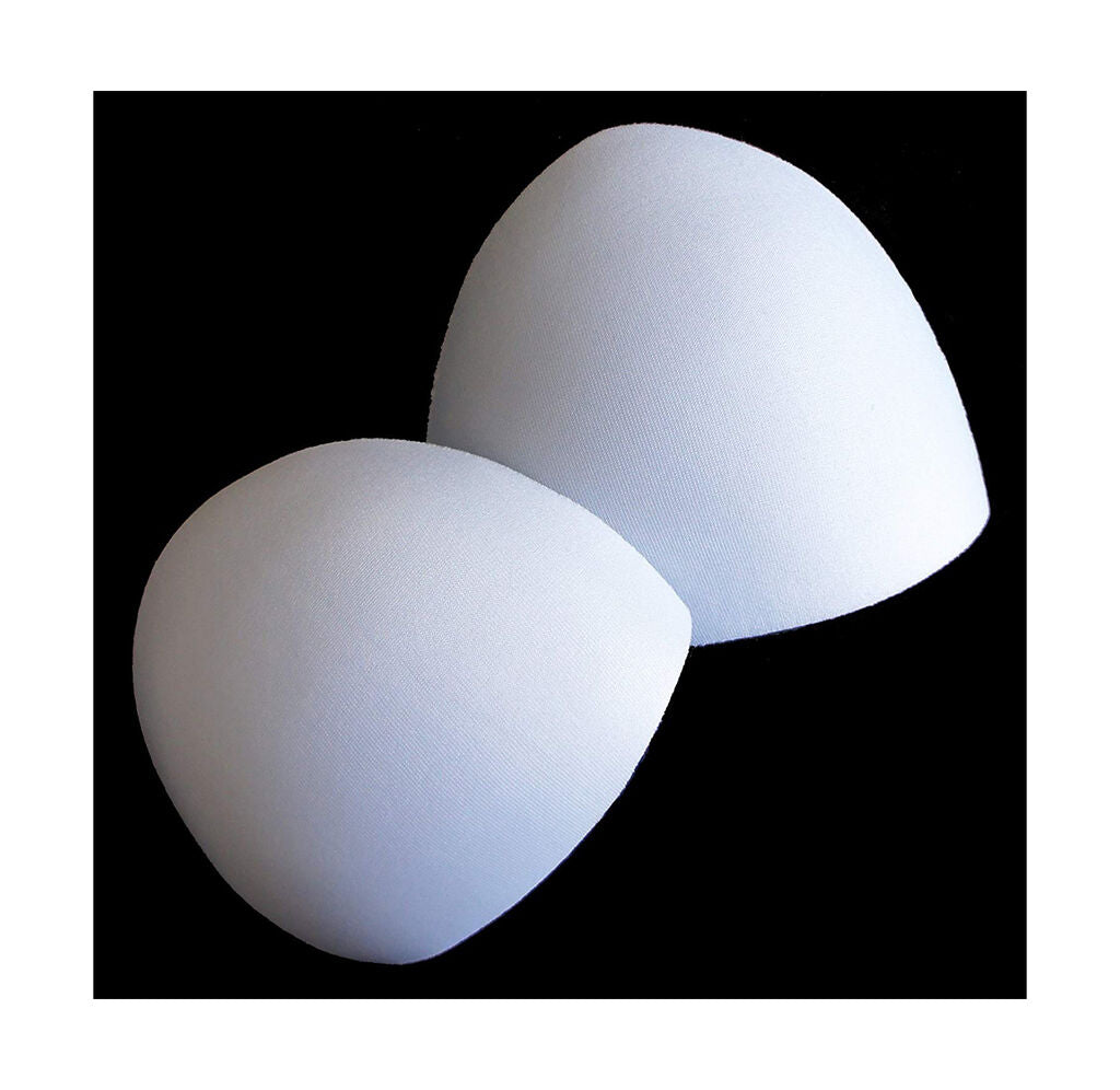 Two pairs of white thin bra pads on a flat surface.
