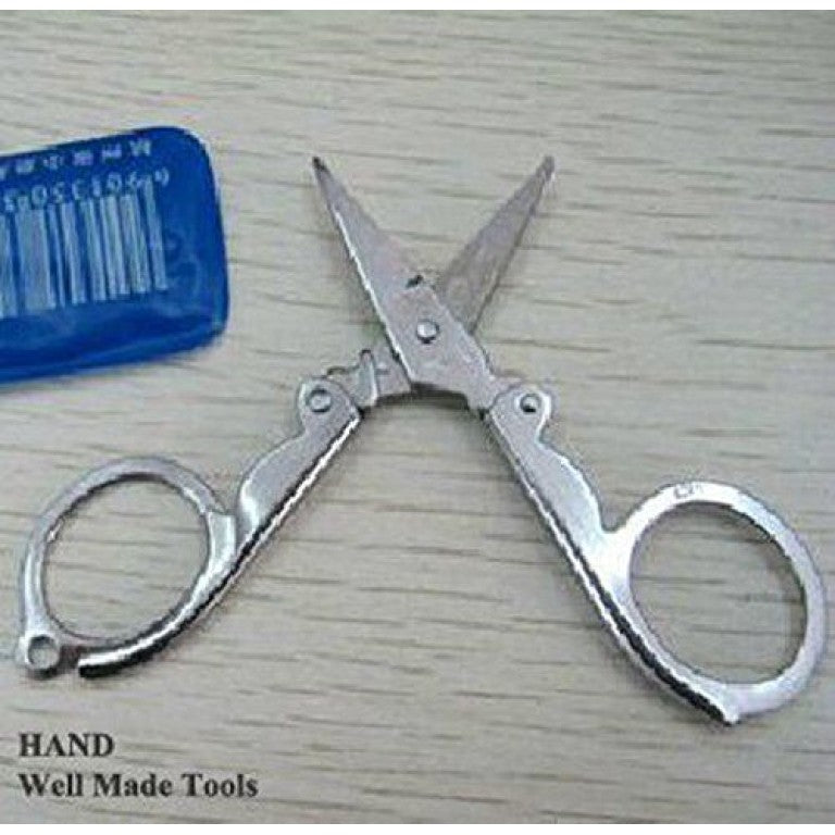 Close-up view of the 4-inch folding safety scissors