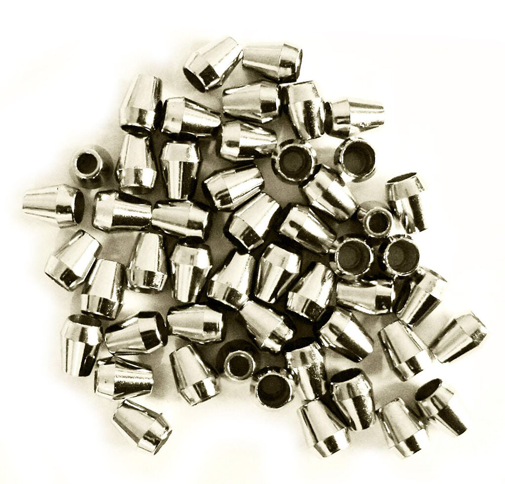 Small plastic metallic silver tone cord fastener ends in a pack.