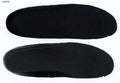 Black PU insoles displayed on a white background
