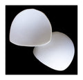 Two pairs of white comfortable bra pads displayed on a surface.