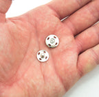Pack of 40 sets of 13mm metal clip buttons displayed on a table.