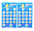 Close-up of silver metal clip buttons for sewing projects.