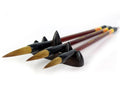 Two large strokes sumi brushes displayed on a white background.