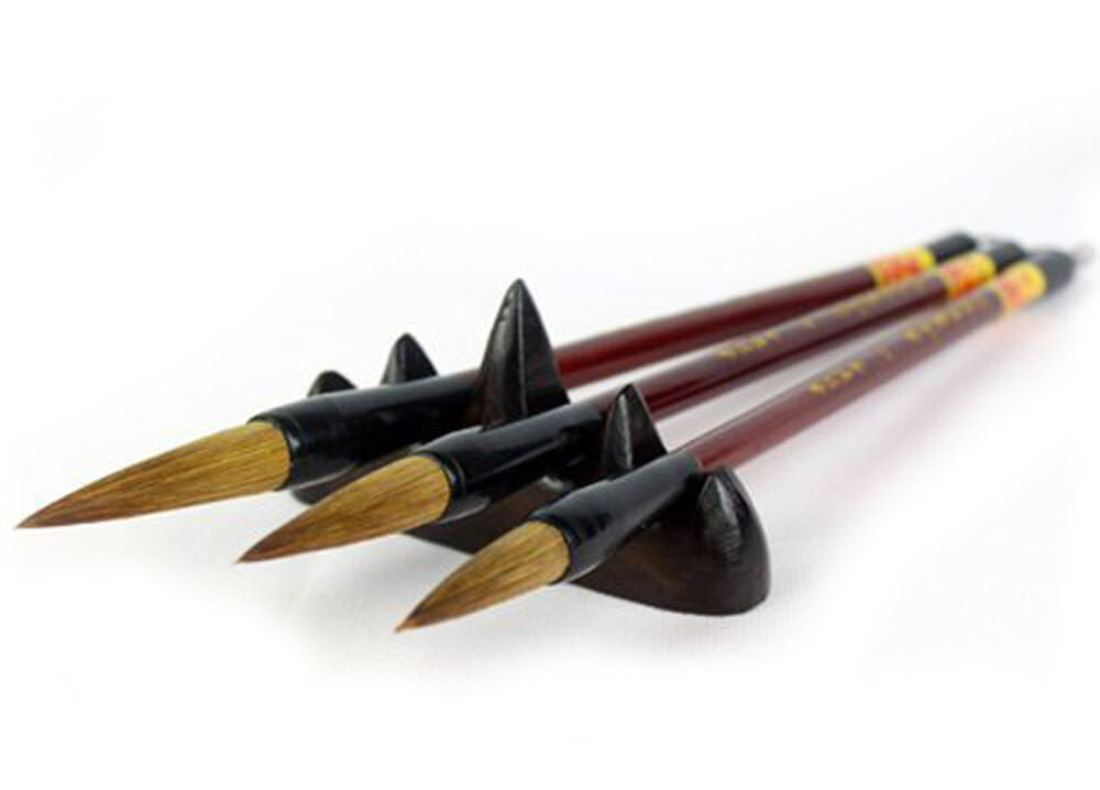 Two large strokes sumi brushes displayed on a white background.