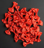 Pack of decorative red ribbon bows with white dots