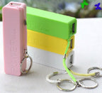 Compact 2600mAh portable battery charger in stylish design.