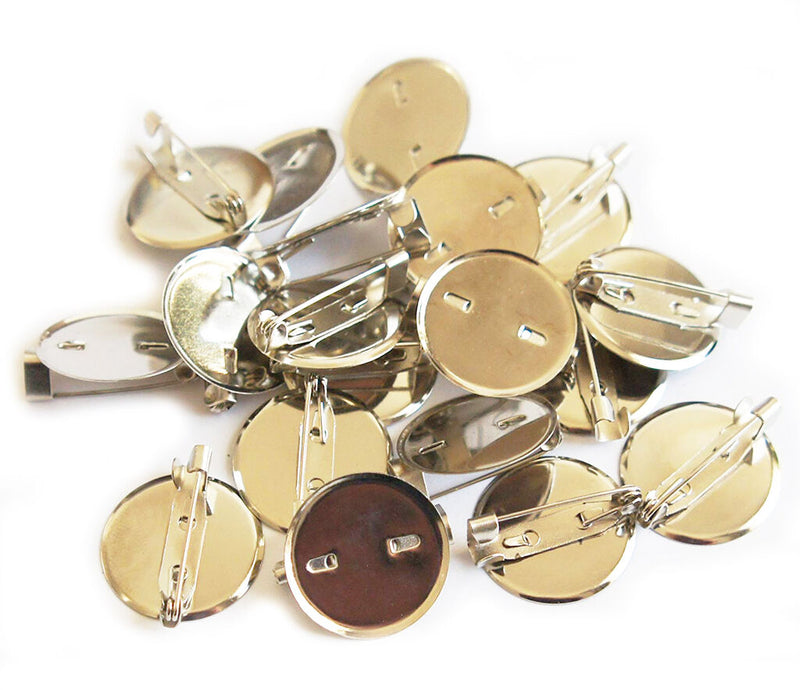 100 round silver plate name badge pins displayed in a pack