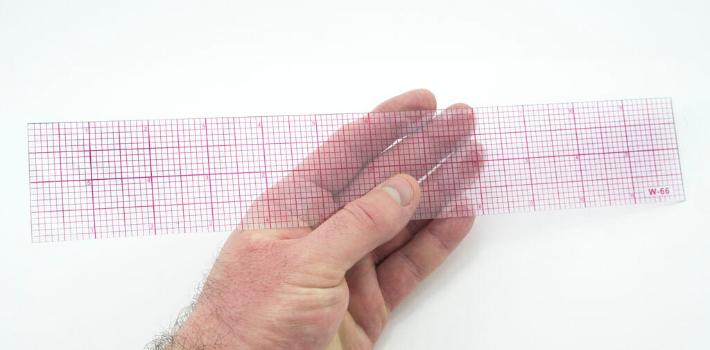 Close-up of the 10ths graph ruler's clear scale and grid.