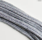 Display of both gold and silver metallic plait cord trims.