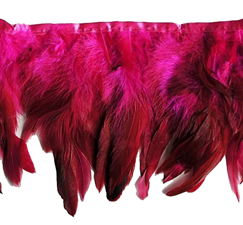 Pink double layer rooster feather trim, 6 inches wide, displayed on a roll.