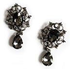 Two vintage brooches with elegant stones and black crystals