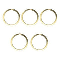Five brass tone metal keyrings displayed together.