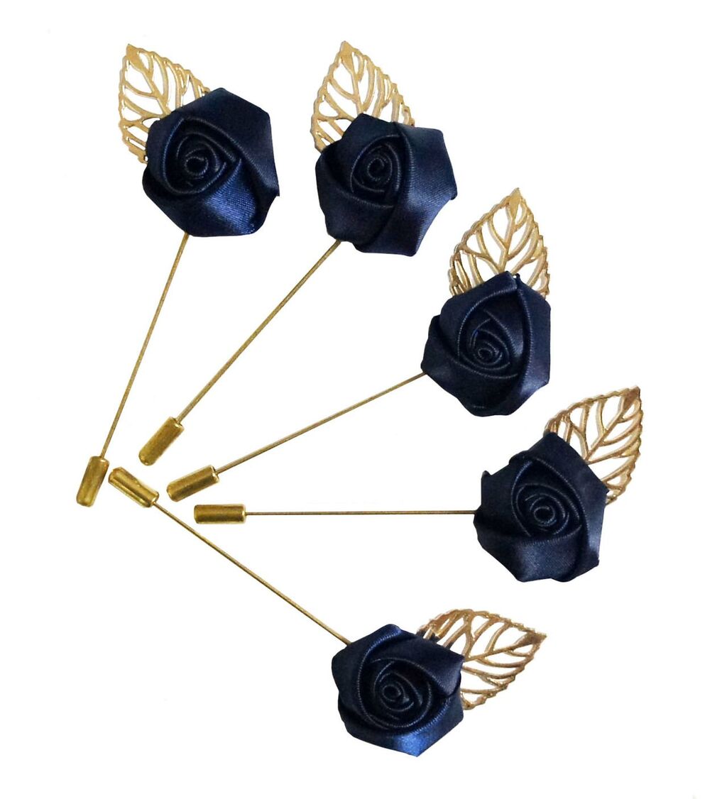 Close-up of dark green and navy flower brooch pin details