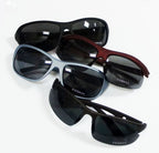 Close-up of dark tinted sunglasses designed for cycling and outdoor sports.