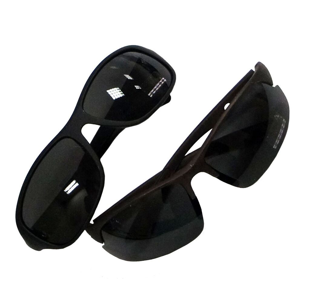 Two pairs of unisex sport sunglasses with dark tinted lenses.