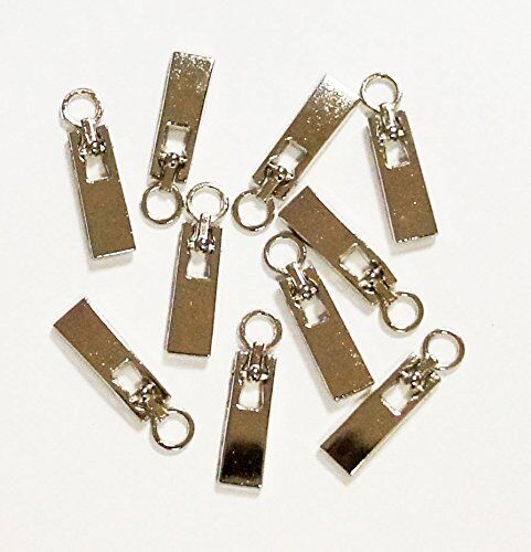 Close-up of a silver zip pull showing eyelet detail