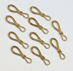 Close-up of a gold zip pull showing eyelet detail and dimensions.