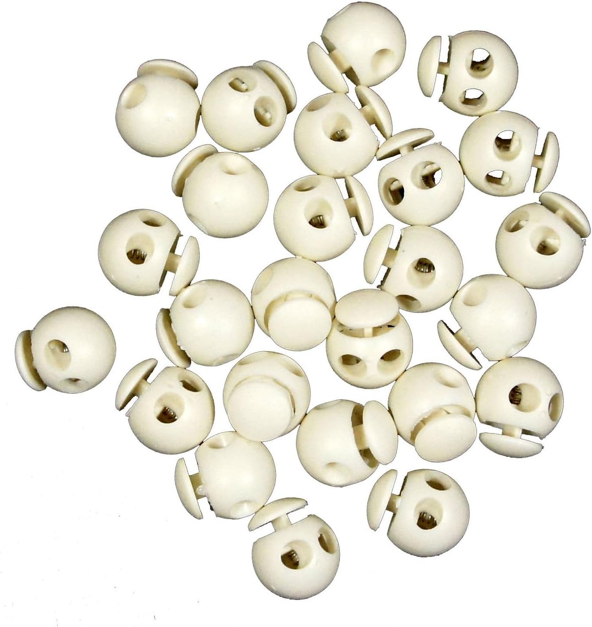 Close-up of white plastic round toggle spring cord locks showing double holes.