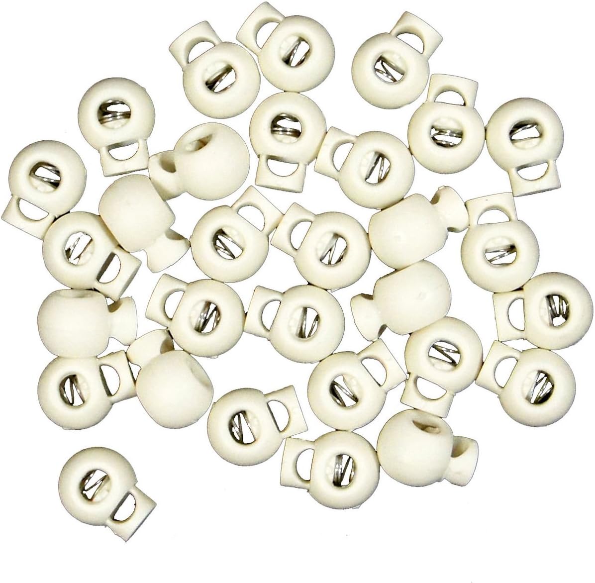 Close-up of assorted sizes of white plastic cord locks.