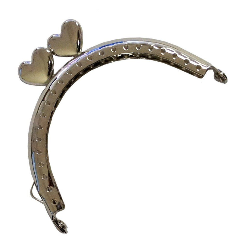 Heart shaped silver tone purse frame with kiss clasp lock.