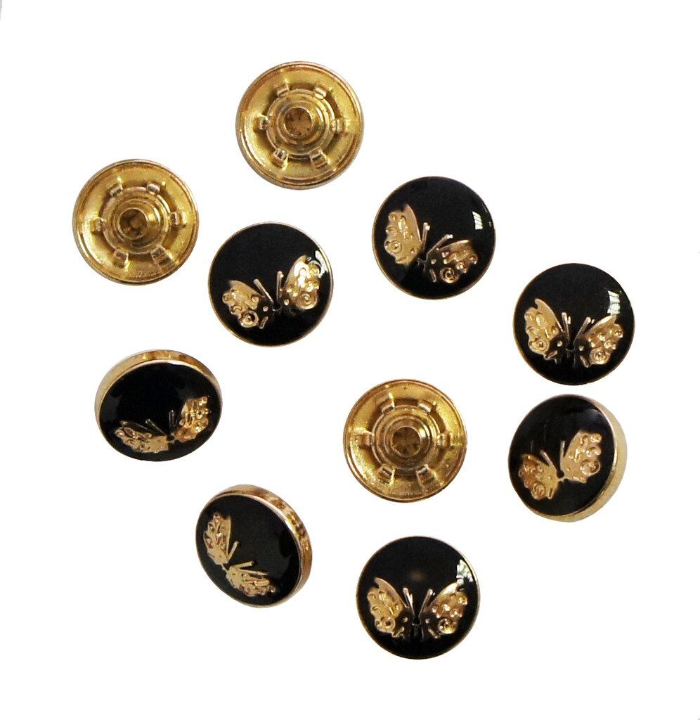 Pack of 10 sets of decorative gold and black press studs.