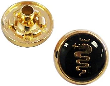Close-up of a gold and black snake top press stud button.