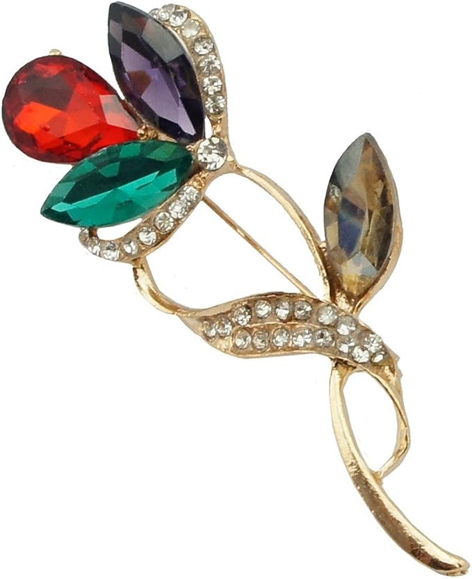 Two elegant gold tone flower brooches displayed together
