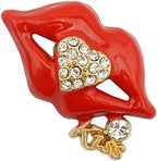 Close-up of a clear crystal gold tone lips brooch highlighting its design.
